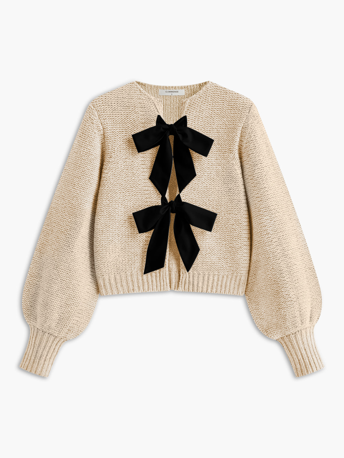Women's knit top with bow accent and structured silhouette