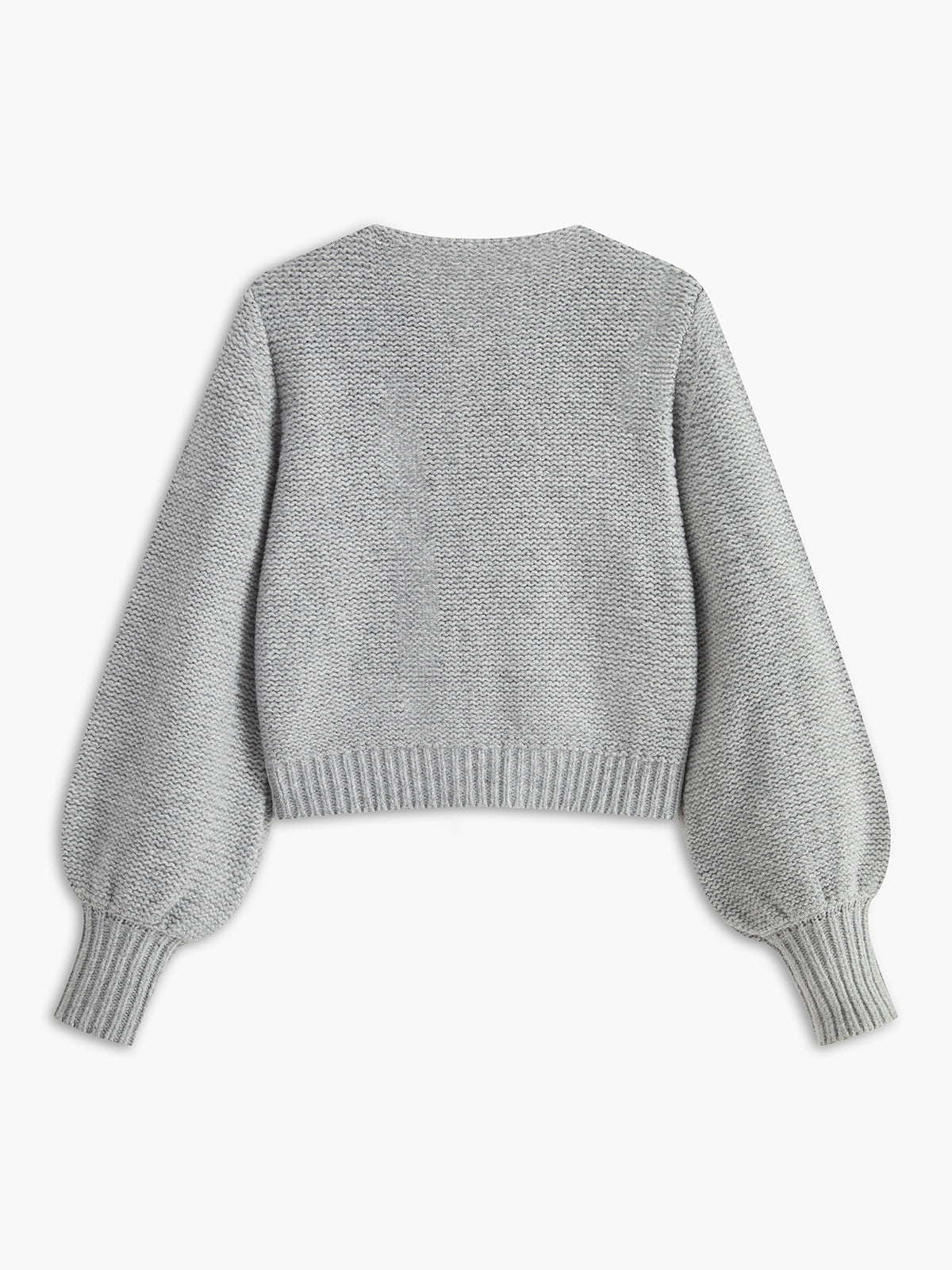 Women's knit top with bow accent and structured silhouette