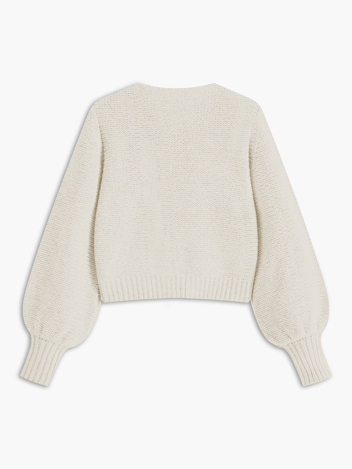 Women's knit top with bow accent and structured silhouette