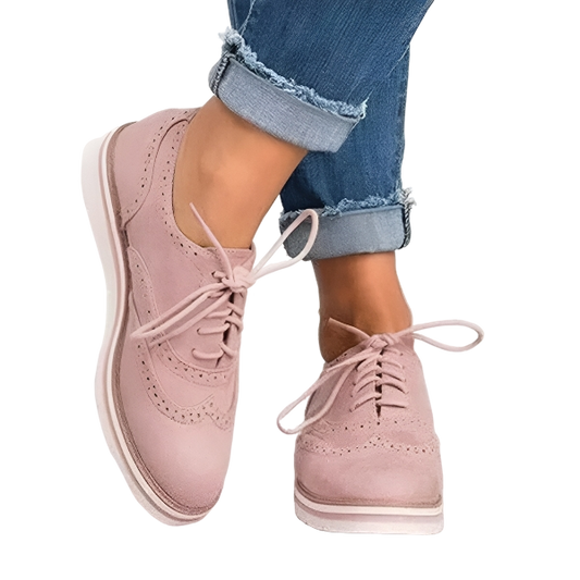 Women's shoes with rounded design and stitched contour